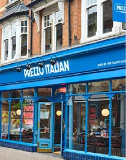 The reopened restaurant with a bright blue shopfront and Prezzo Italian sign.