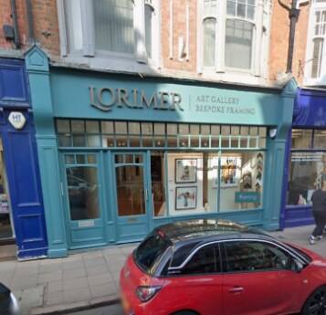 The Lorimer art gallery with a teal painted shopfront.