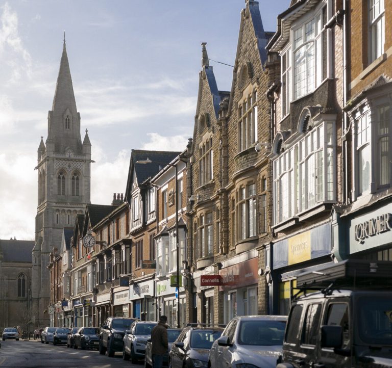 Regent Street looking south, with shops and St Andrew's Church spire.