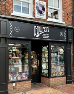 Hunts Bookshop after the grant, with a restored traditional black shopfront and gold lettering.